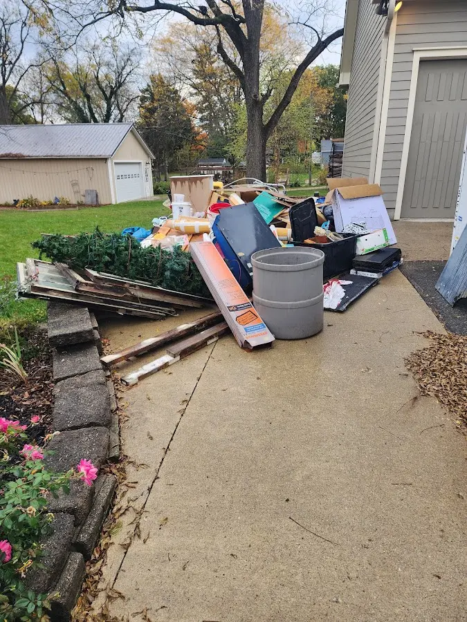 Dumpster being loaded with debris for Residential Dumpster Rental in Lebanon